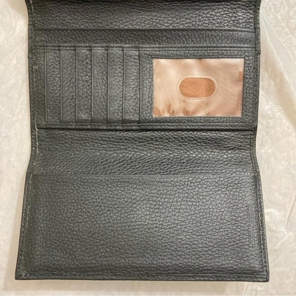 Dooney and Bourke rare perforated black pebbled leather 2 piece wallet set